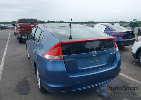 2010 Honda Insight Ex from USA, damaged, VIN JHMZE2H71AS017982